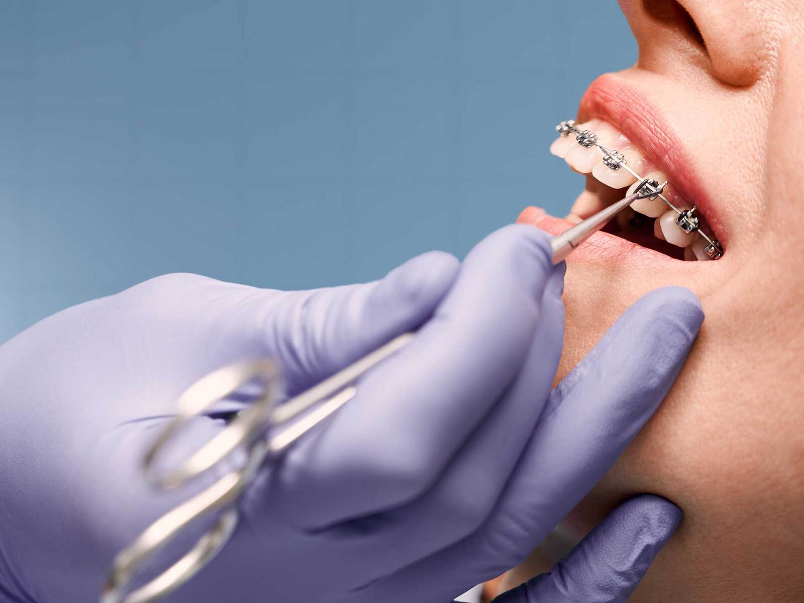 Dentist providing advanced smile transformation treatments to help patients achieve healthy, beautiful smiles.